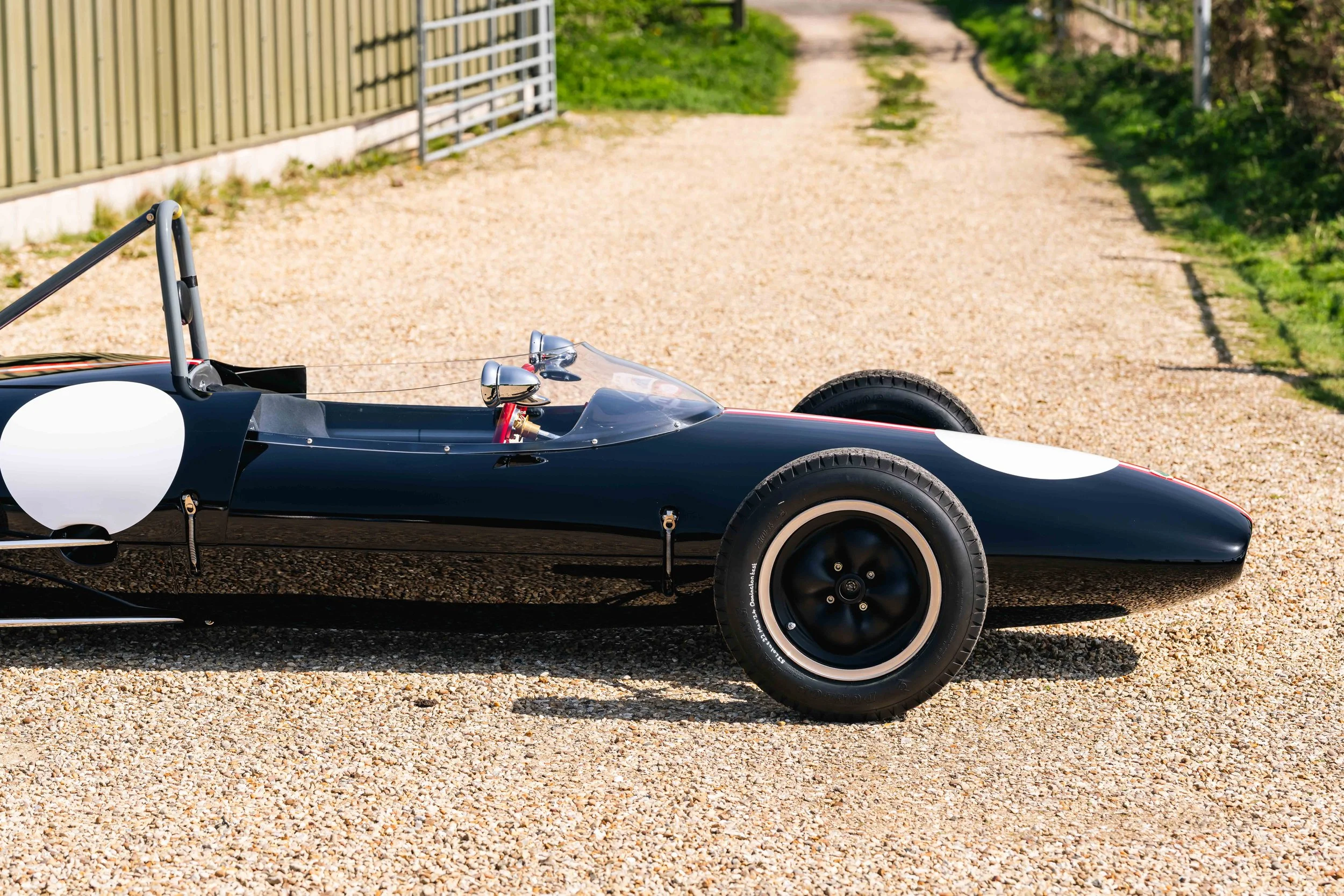 Lotus 22 Formula Junior – right side profile, chassis 22-J-39, black livery with Austrian stripes
