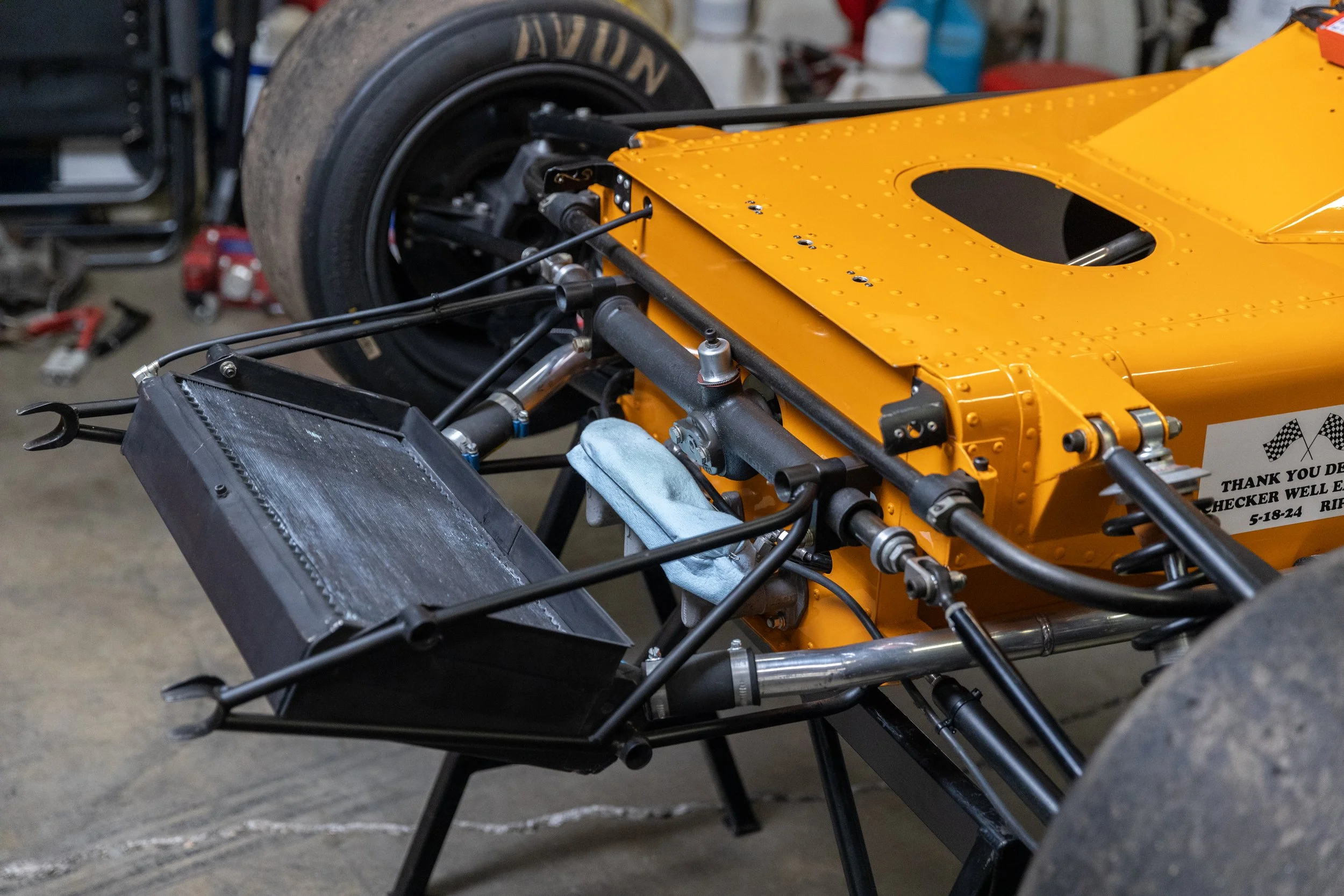 McLaren M21 Formula 2, chassis M21-3 — right side suspension and chassis detail, aluminium monocoque construction