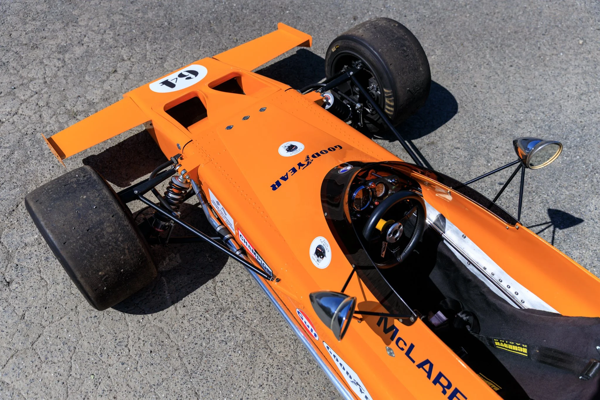 McLaren M21 Formula 2, chassis M21-3 — overhead view of cockpit and front suspension, McLaren nose lettering visible, Papaya Orange bodywork