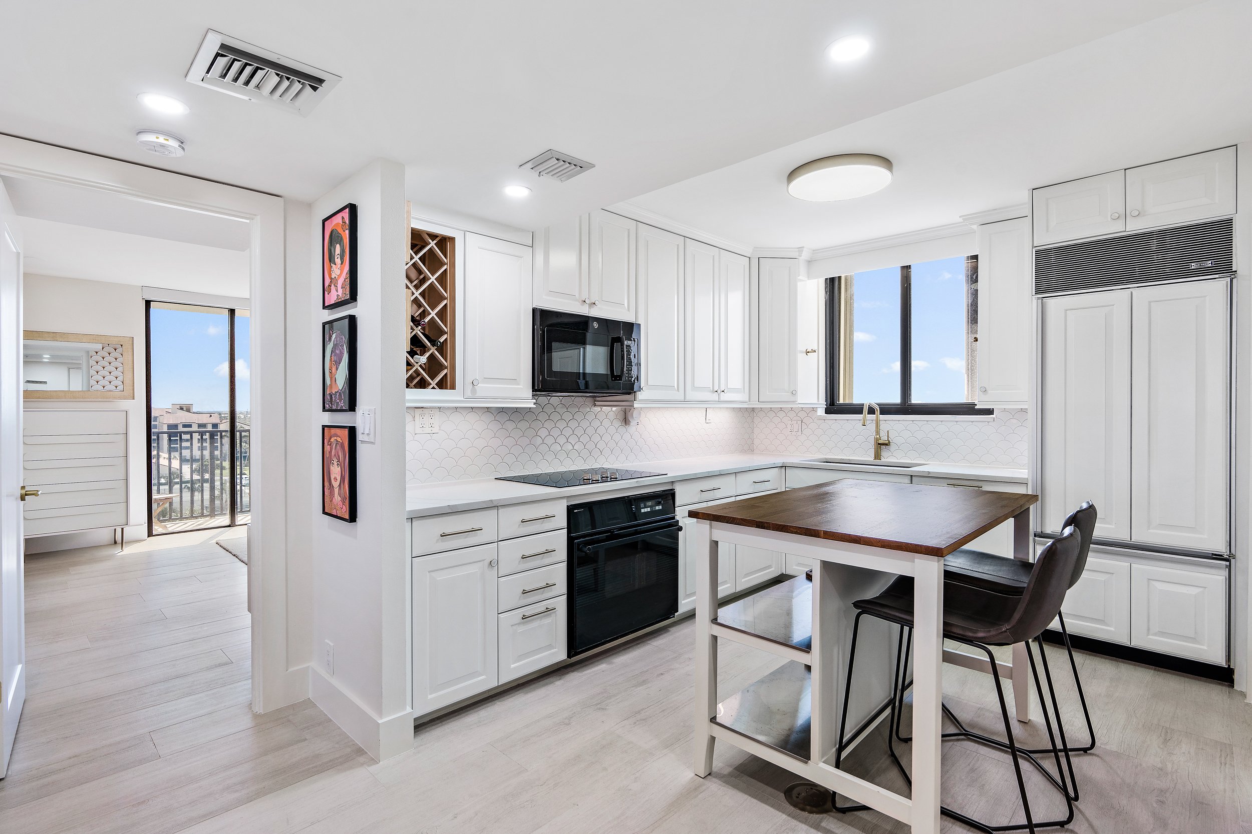 Spacious Kitchen With Wine Storage and Seating for two at the Bar