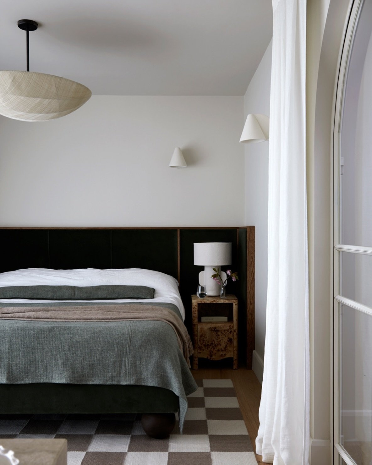 The master bedroom at our latest project. The bed, headboard, throw, cushion and rug are bespoke.
Design by @indie.and.co photography by @annastathakiphoto  Rug and throw by @allwina.official headboard and curtains by @kls.interiors pendant by @pinch