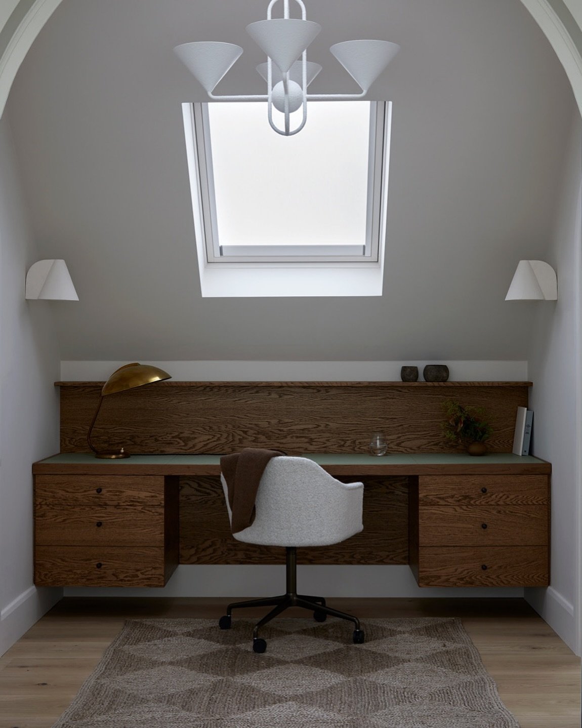 More from our latest project in Wimbledon, a bespoke desk with leather top and vintage brass desk lamp make it the perfect work from home spot away from the hustle and bustle  Joinery by @enviro_furniture pendant by @sohohome wall lights by @marizaga