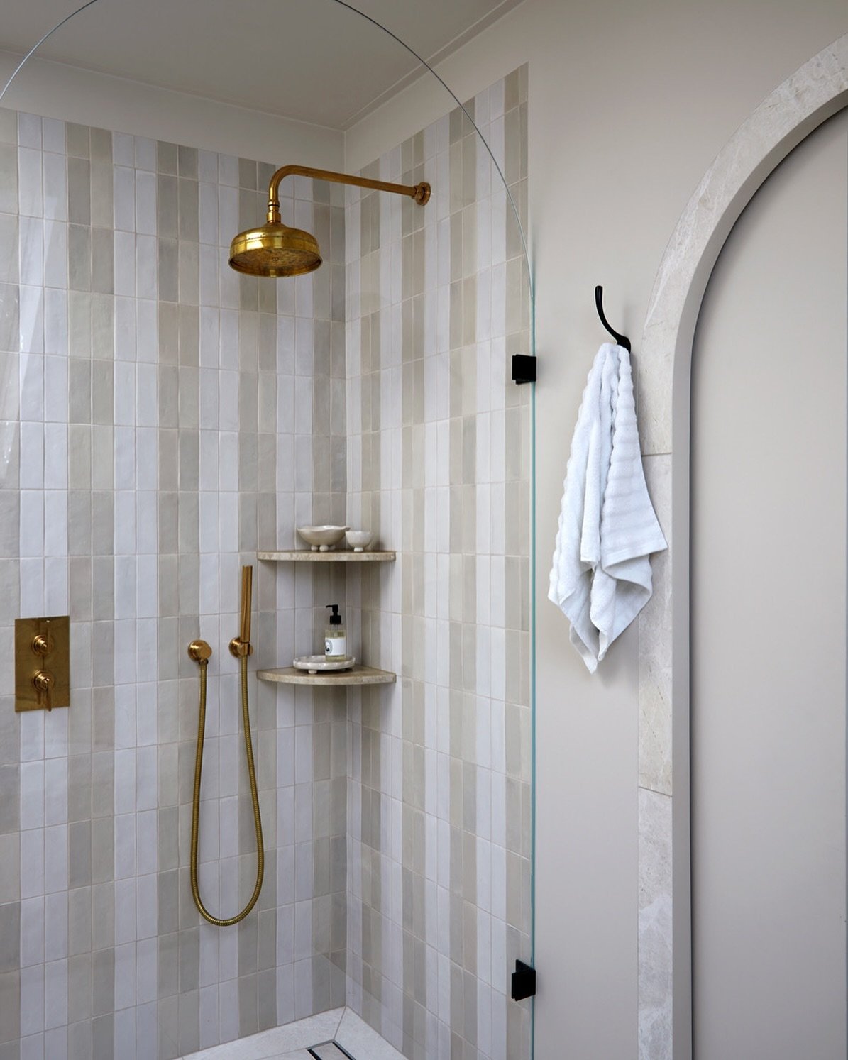 We love a stripe&hellip; another shot of our latest project in Wimbledon. Designs by @indie.and.co photography by @annastathakiphoto stone shelves by @marblecityltd tiles by @claybrookstudio taps by @studioore floor tiles @mandarinstoneofficial