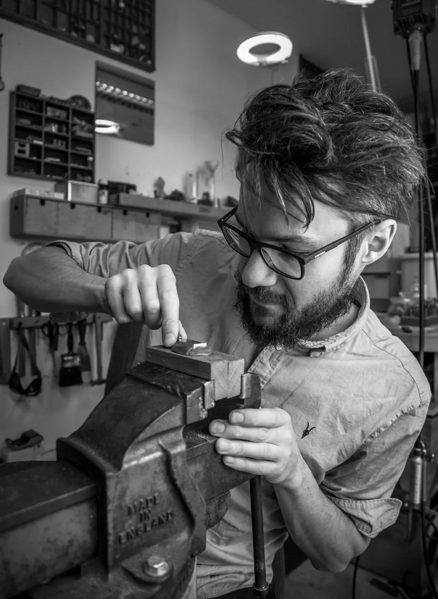 Chris Boland working on his jewellery designs in his workshop