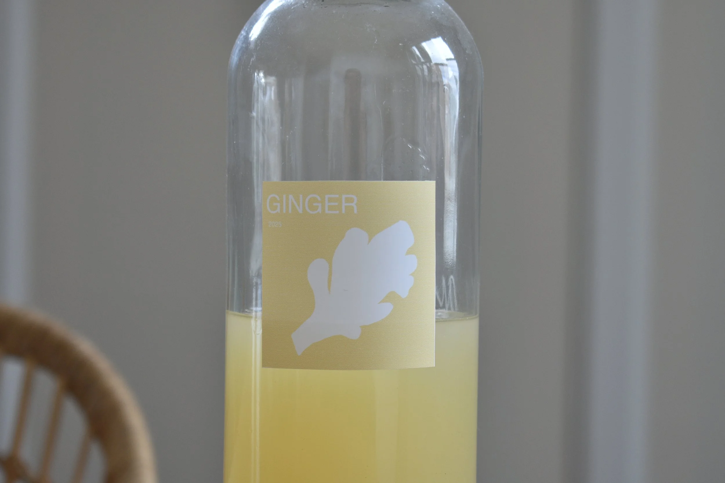 A glass bottle with ginger liqueur