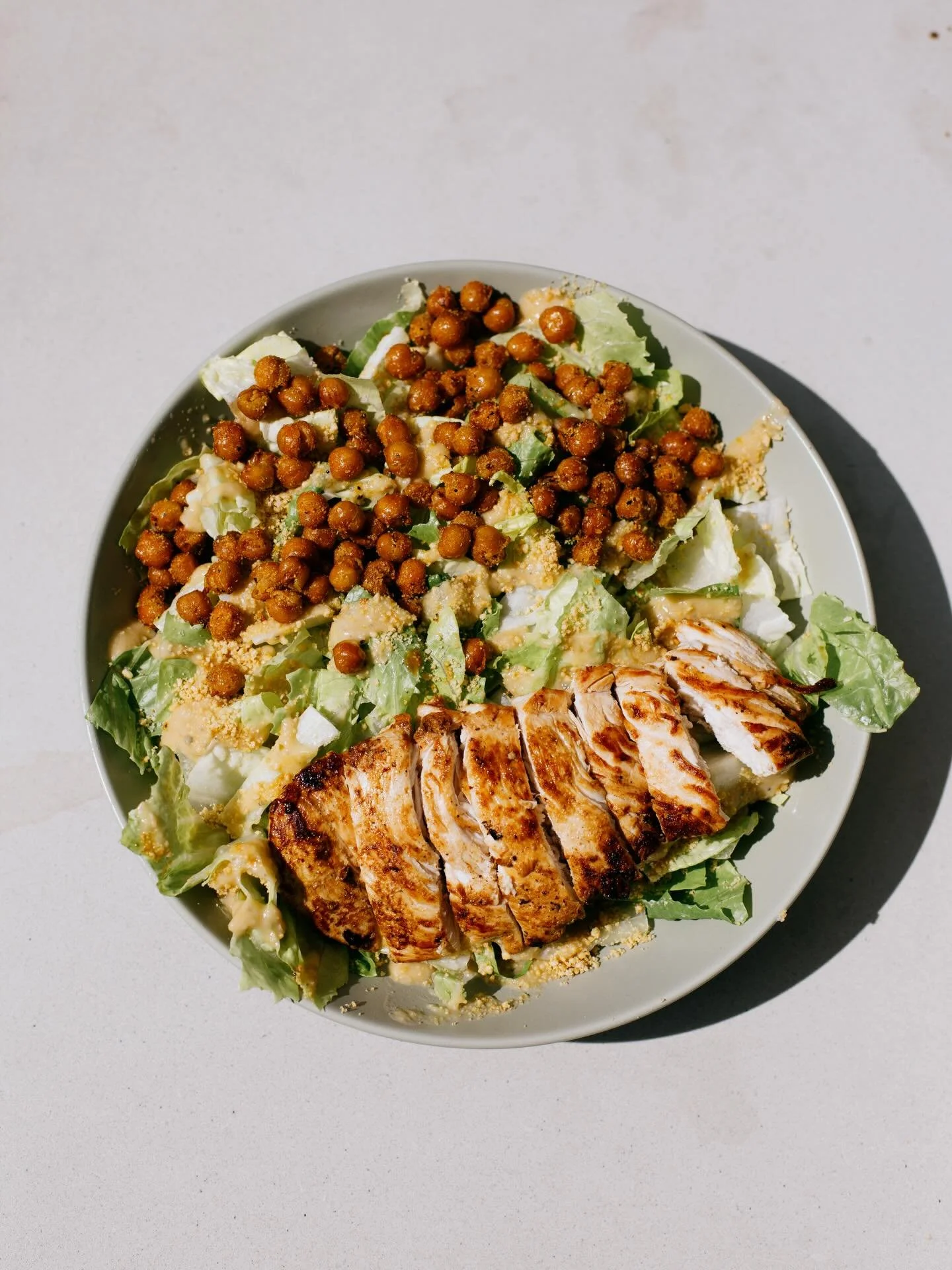After a two year hiatus the Vegan Caesar is back on the menu! 🥗 

Fresh Romaine, house-made vegan caeser dressing, crispy chickpeas, vegan parm. This hearty/savory salad is truly for anyone and is further leveled up with a grilled chicken breast on 