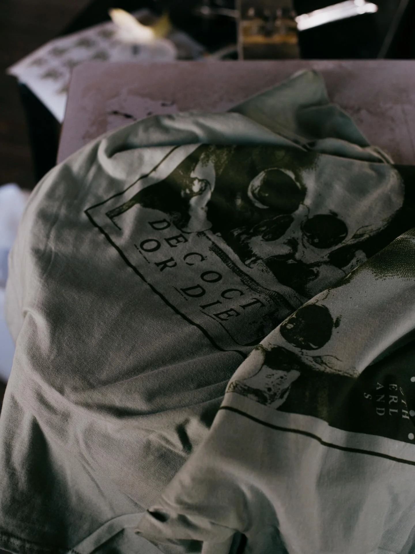 As requested Decoct or Die shirts are back💀

Moss green on sage. Gildan light cotton for the incoming summer heat. Limited run. 

Printed in house!