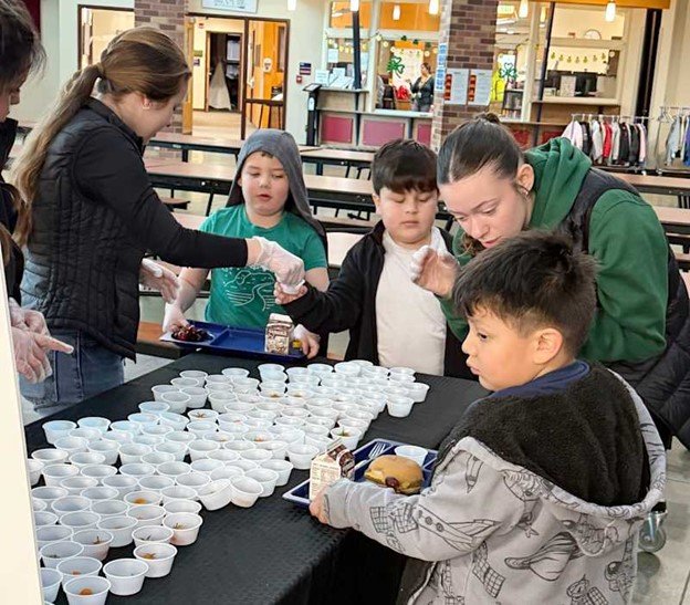 WaHi Students Share Fresh Harvest with Edison Elementary