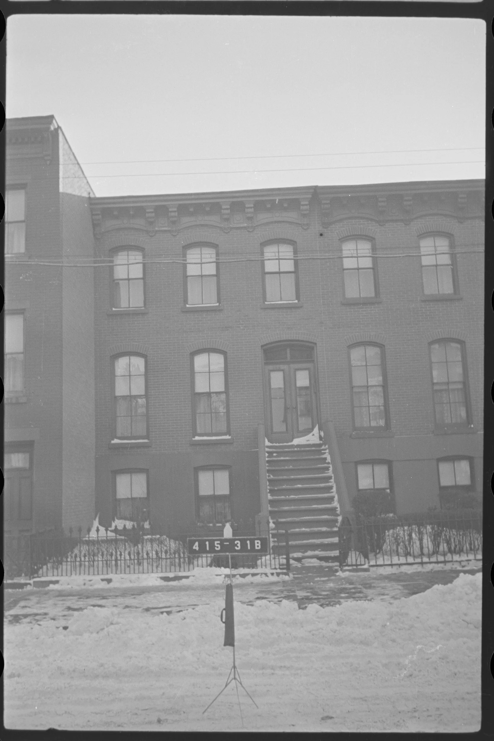Black and white tax photograph circa 1940 of brownstone on Douglass Street, Brooklyn, New York.