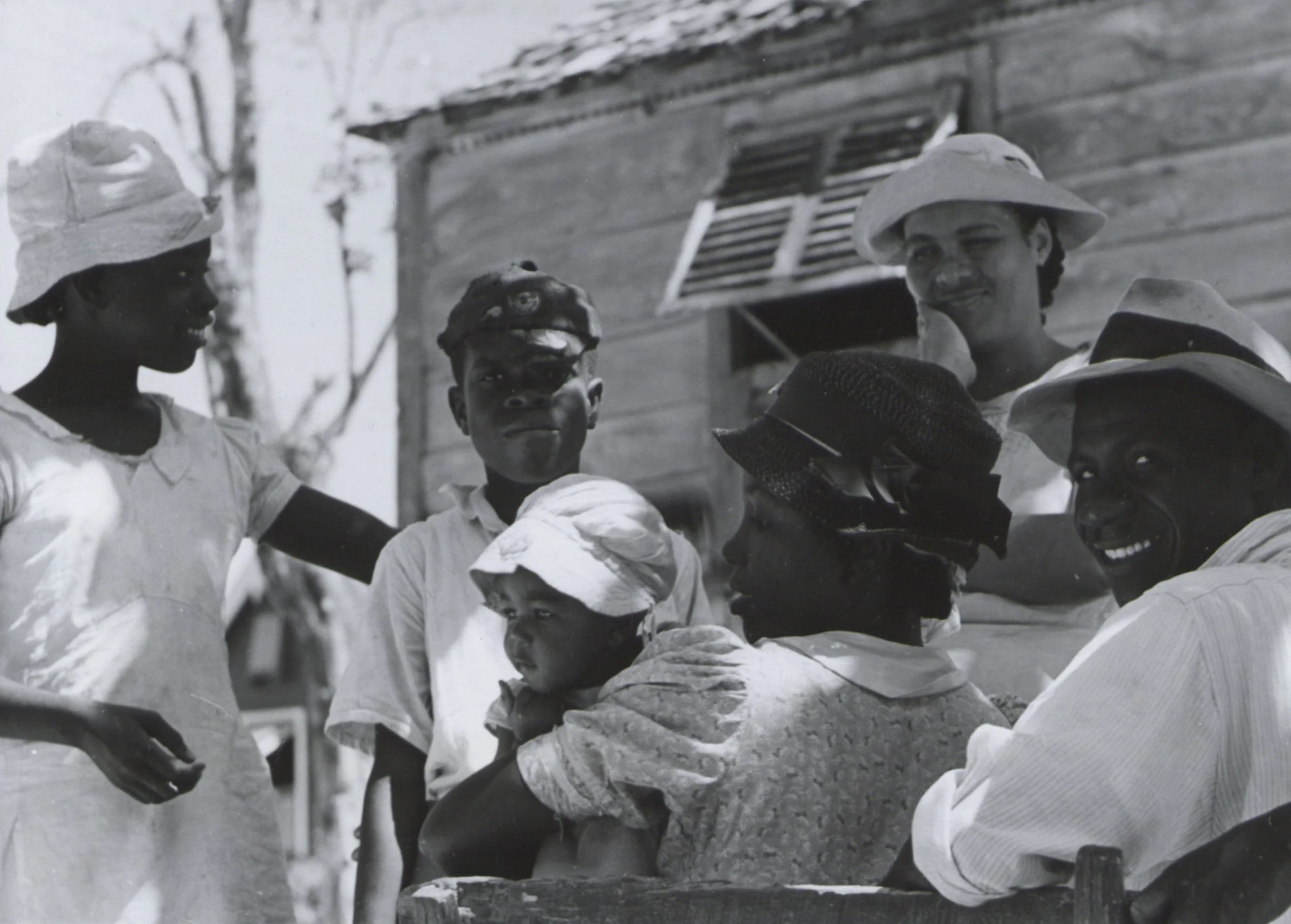 Historic photograph of several generations of Barbadians dated 1955.