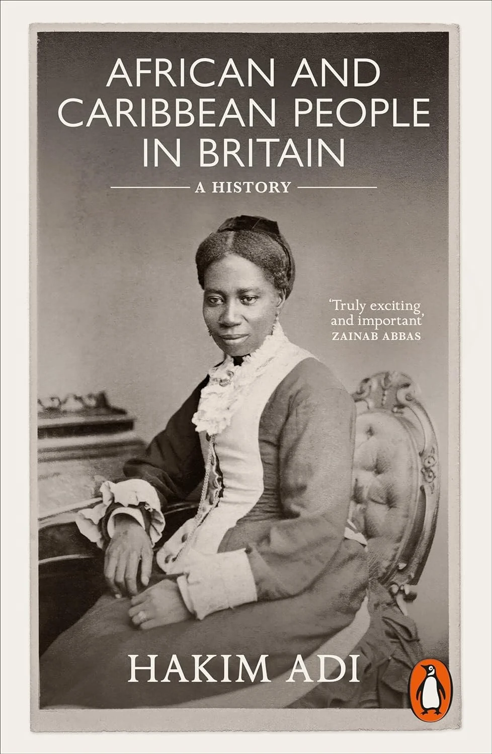 Book cover for 'African and Caribbean People in Britain: A History' by Hakim Adi. The cover features a black and white historic photograph of an African woman sitting in an ornate chair, dressed in period clothing, with a quote from Zainab Abbas.