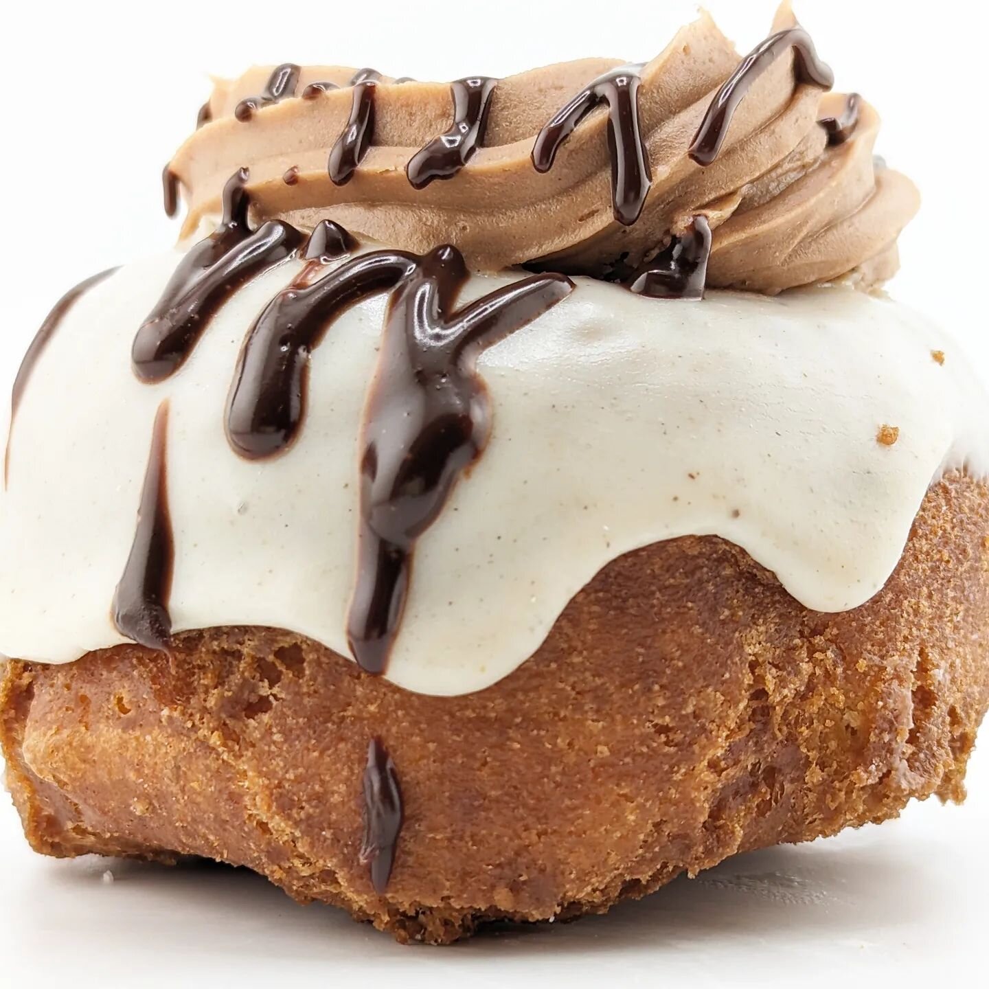 Spicy Chocolate Chai #donut - Old fashioned dipped in chai glaze, topped w/ spicy chocolate buttercream and spicy choc sauce