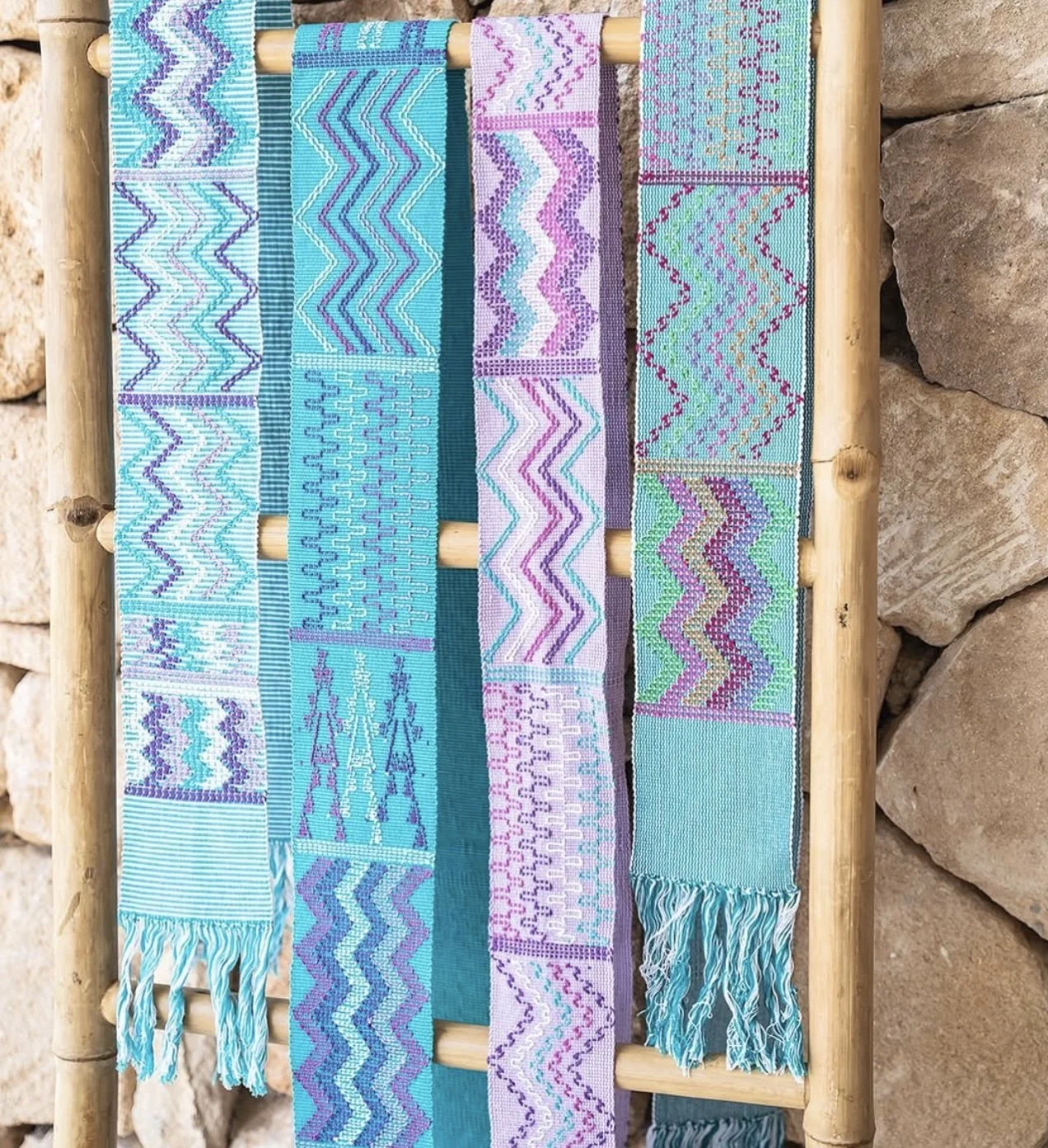 Image: Traditional handloom textile showcasing intricate weaving patterns. Photo credit: @titanabelt