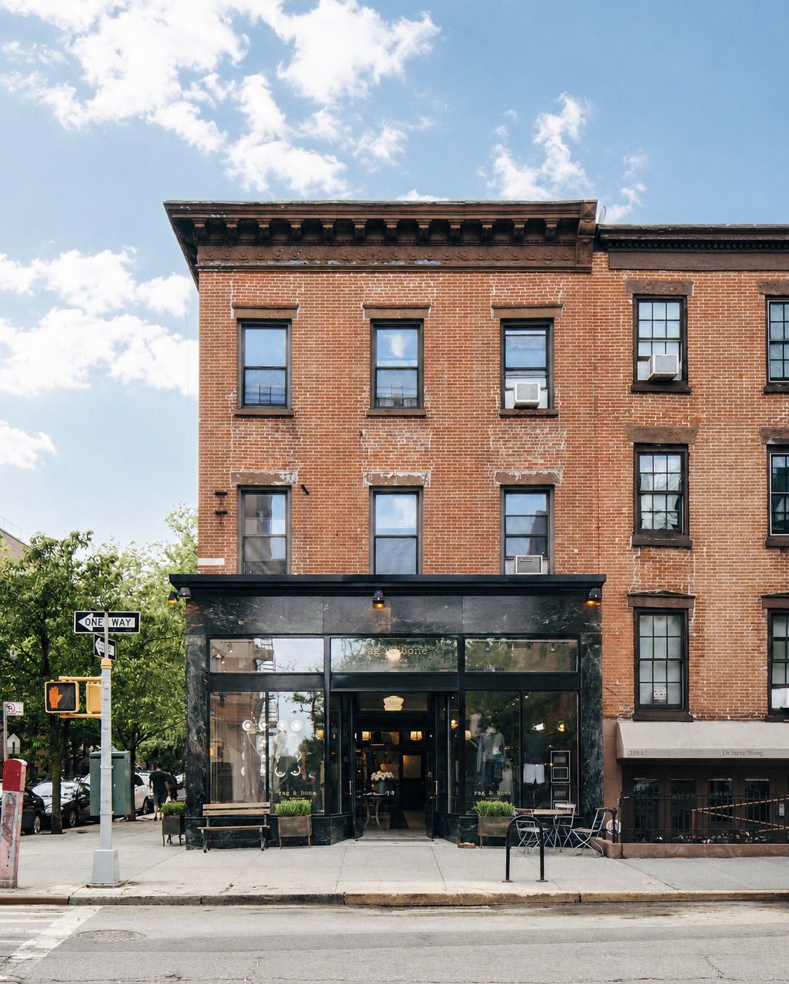 BLD commercial retail adaptive reuse in Brooklyn, New York includes remnets of the former bar, transparent entry creating a welcoming transition from the street, thoughtful zoning for apparel, accessories, and fitting areas