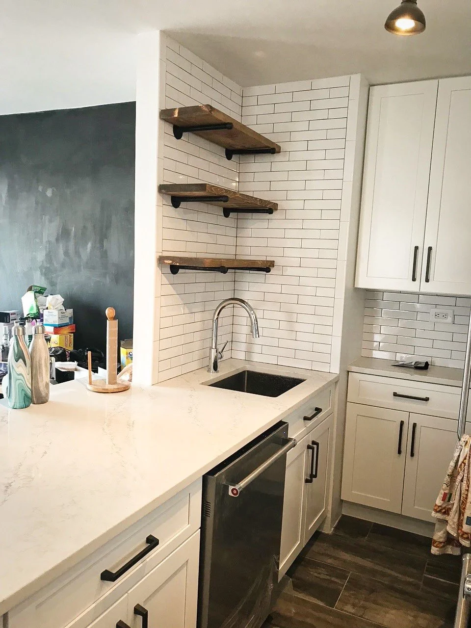 BLD residential rennovation in New York, rennovations included removing partitions, opening up the bed to the closet, sleeping area doubled in space, swing doors converted to black steel-framed glass sliding doors