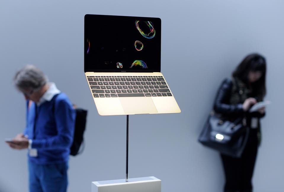 The incredibly light MacBook Air required a way of displaying it that made it look as if the computers were floating. The white plinth and polished stainless steel rods were meant to be as invisible as possible. Though it was a simple project, it was