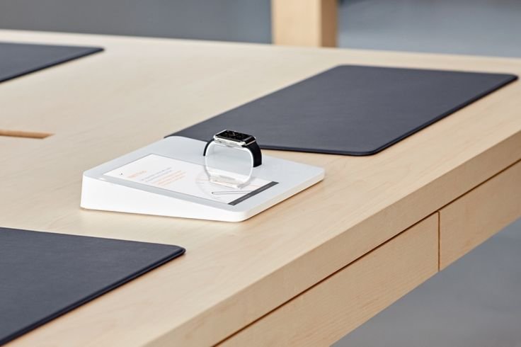 This Smart Display for Apple Stores has a deconstructed iPad and integrated Apple Watch that are connected to each other so that people can interact with the Watch and learn about it.