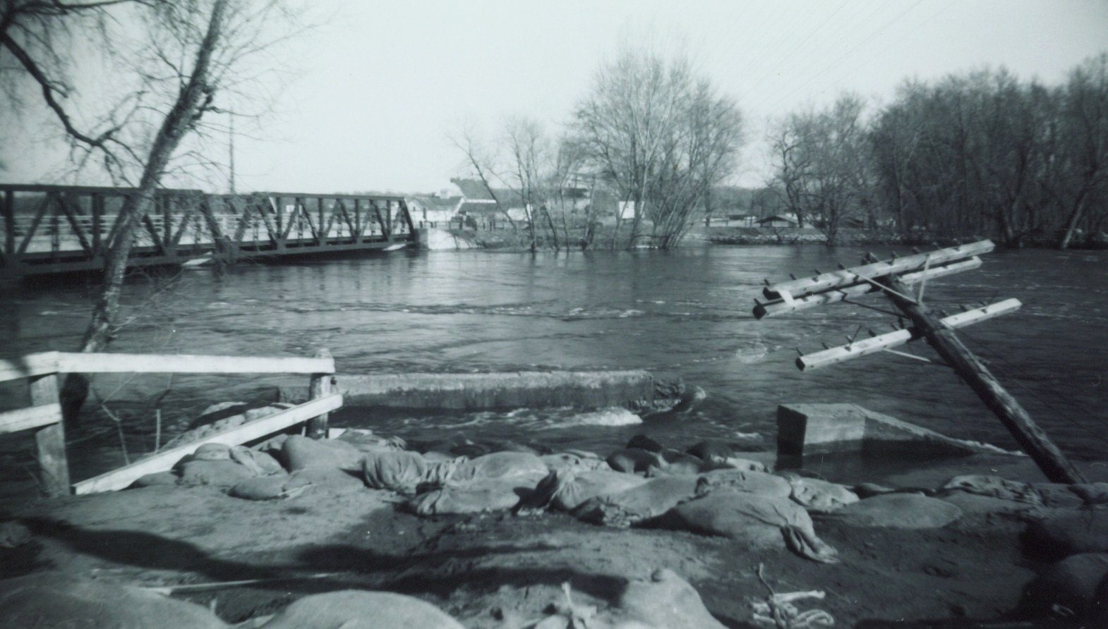 Here is a photo from almost exactly 59 years ago. The Crow River flooded periodically, but flooding in 1965 was the worst for this area. It followed a snowy March which included the St. Patrick&rsquo;s Day blizzard. The Crow River reached its highwat