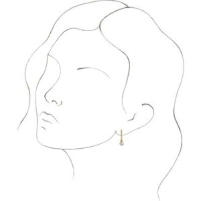 14k yellow gold endless huggie hoop earrings with dangle pearl charm. Shown on model ear.