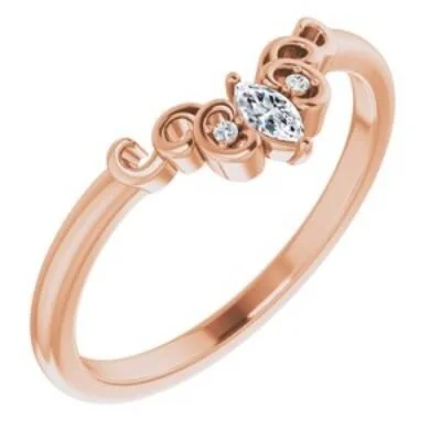 14k rose gold band with marquise and round cut diamond accents with scroll detail in the gold.