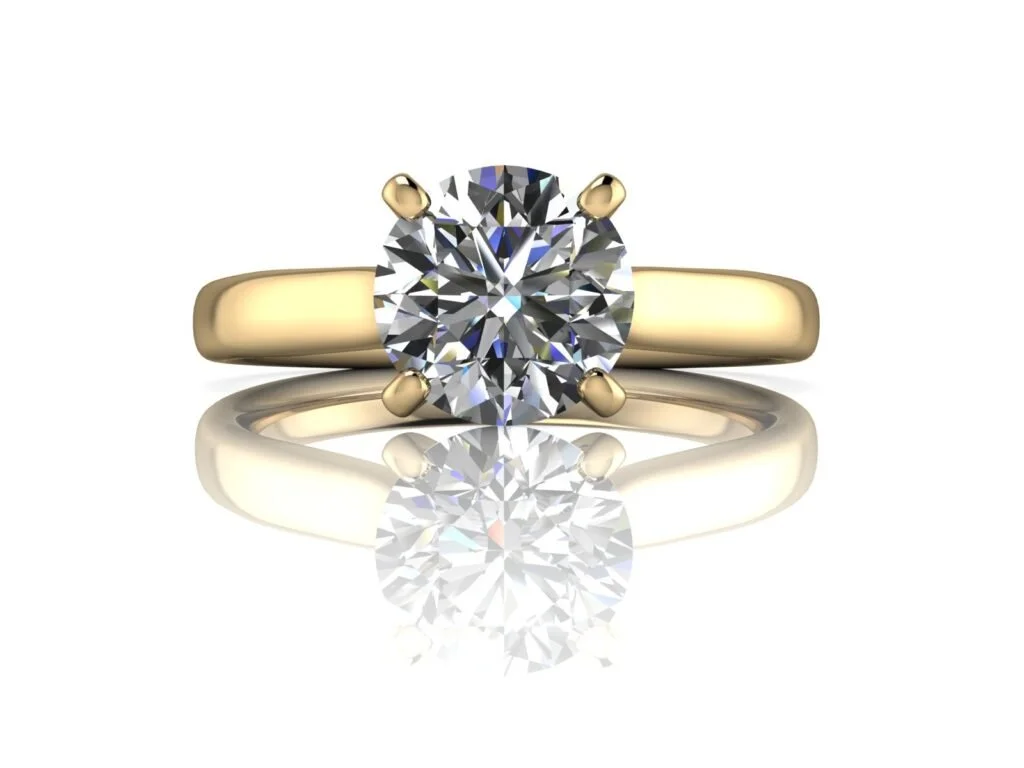 14k yellow gold cathedral style solitaire engagement ring with a round center stone.