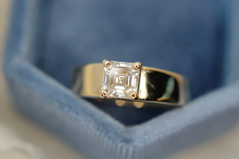 Princess Cut Thick Band Solitaire in yellow gold