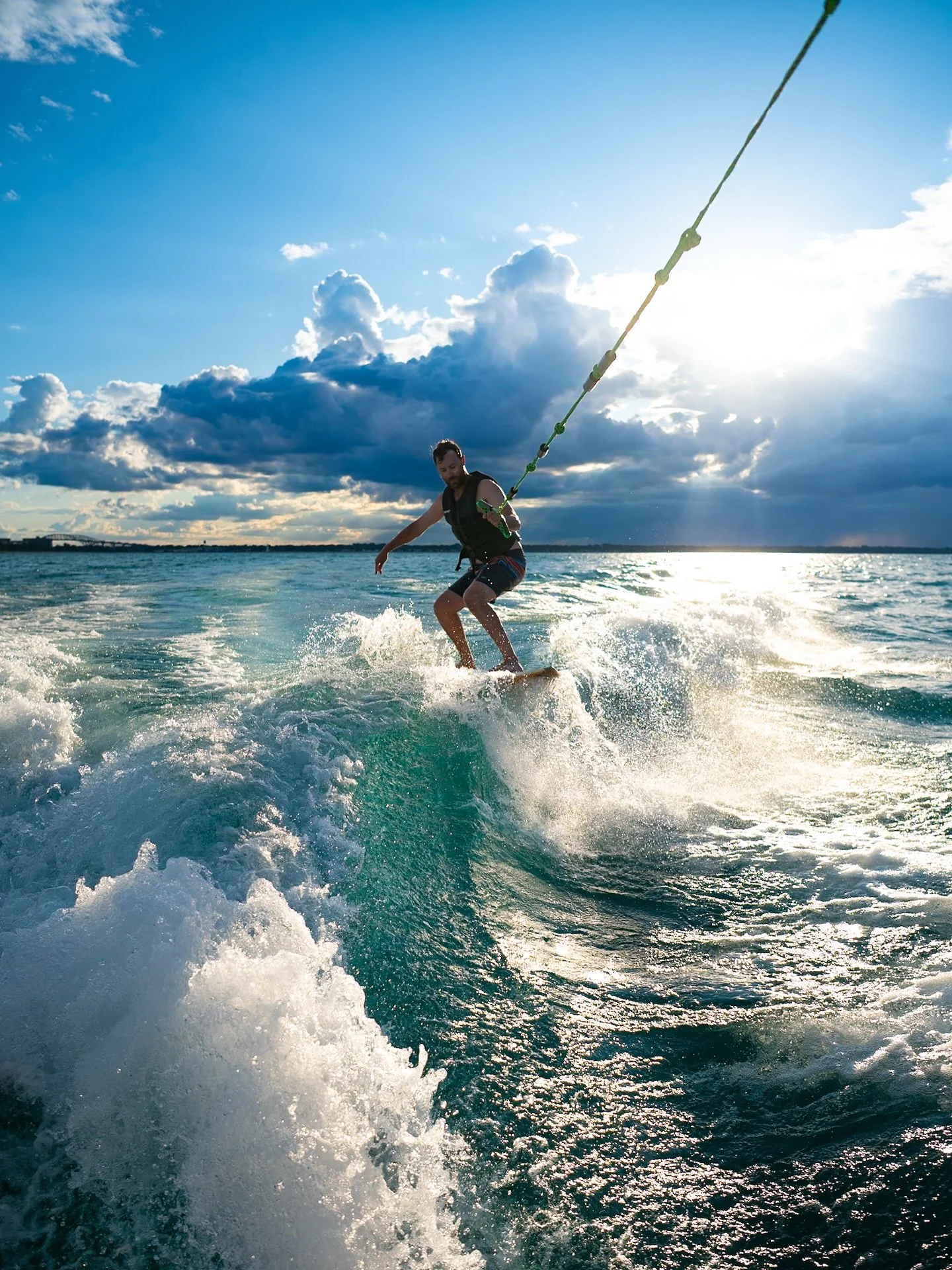 Sometimes you take a photo and think, &quot;Wow, I actually captured that?!&quot; 
I love this wake surfing shot because for me, it perfectly captures the thrill and light of summer! 
☀️🌊 

How lucky are we that this is where we live! #lakehuronlove
