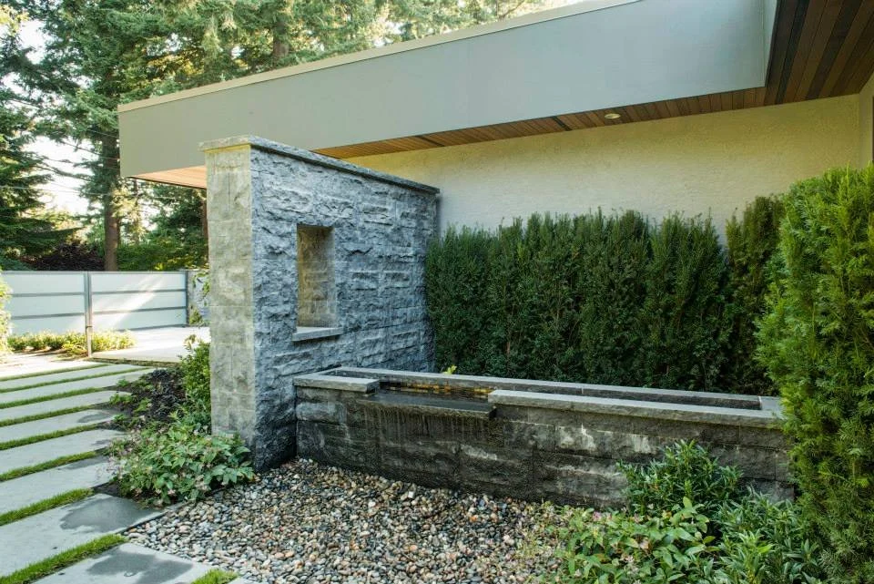 Outdoor Masonry and xeriscape landscaping Construction design build rock waterfall Bend Oregon