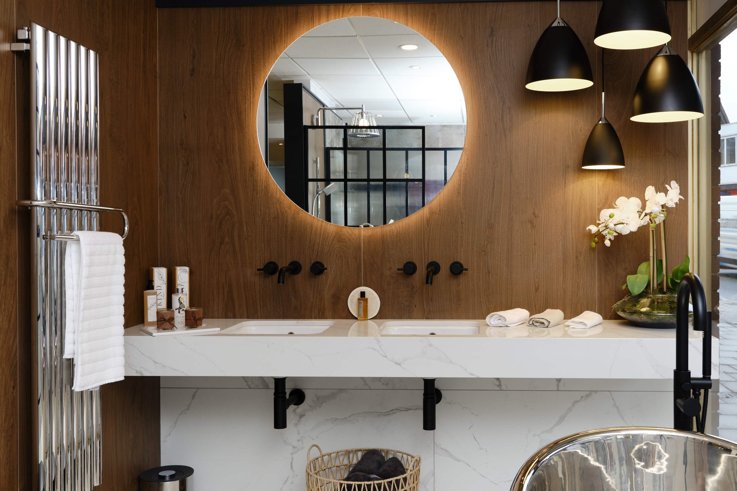 ripples-solihull-showroom-with-wooden-panelling-and-round-mirror.jpg