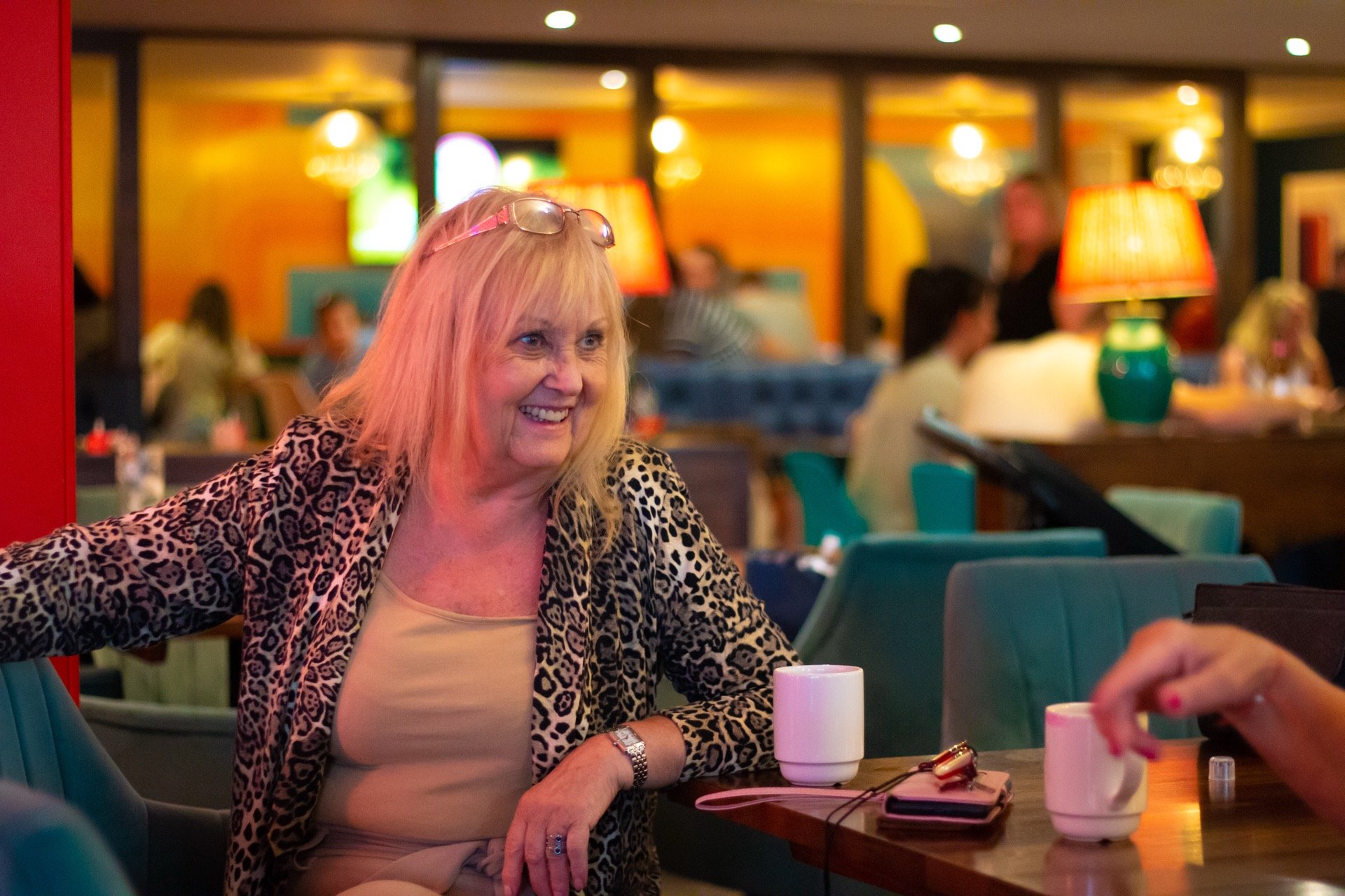silver-sands-holiday-park-entertainment-lady-enjoying-coffee-in-evening.jpg