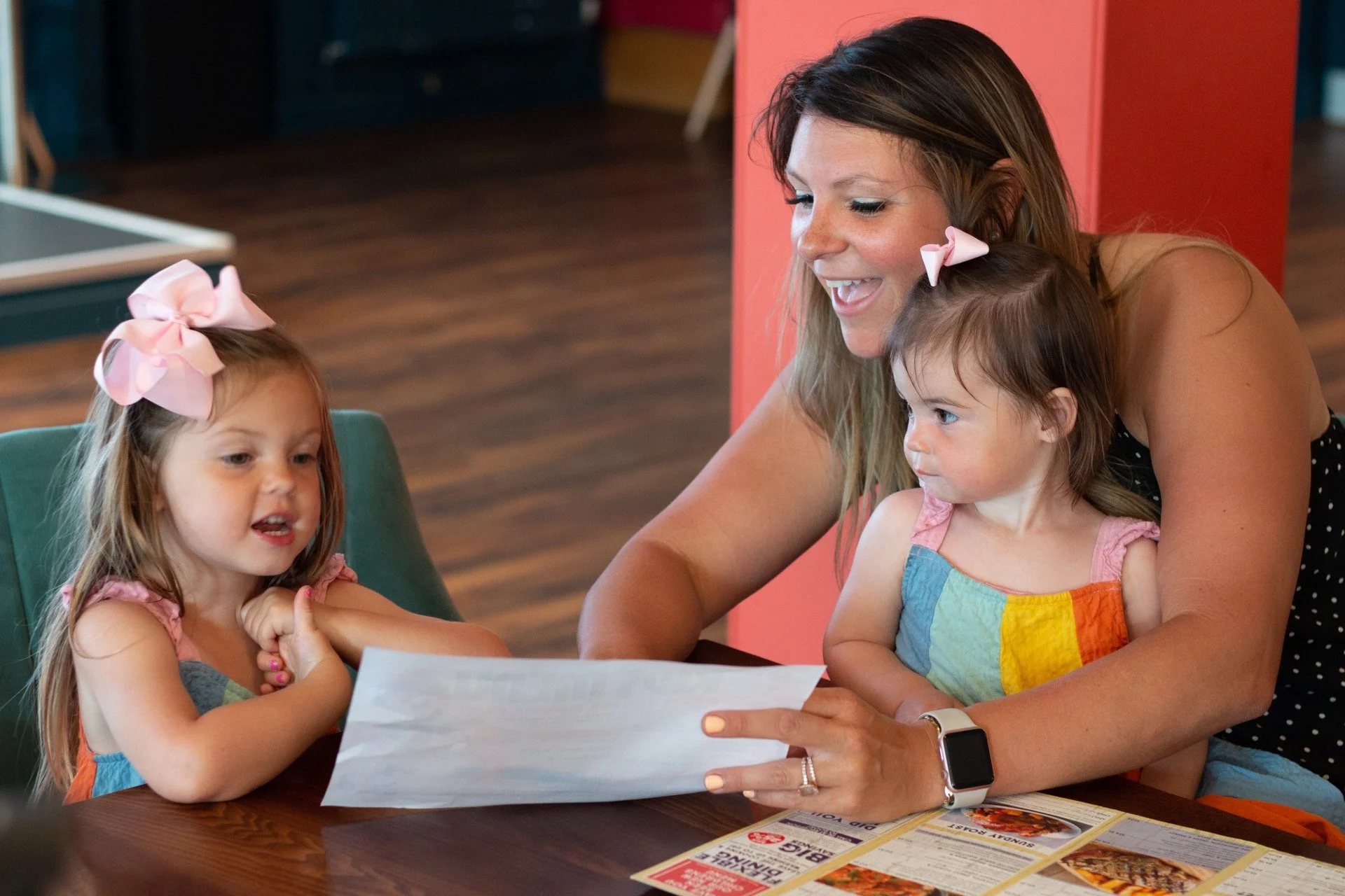 silver-sands-holiday-park-restaurant-looking-through-menu-with-children.jpg