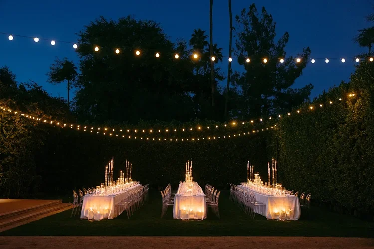 the parker palm springs candle lit wedding reception.webp