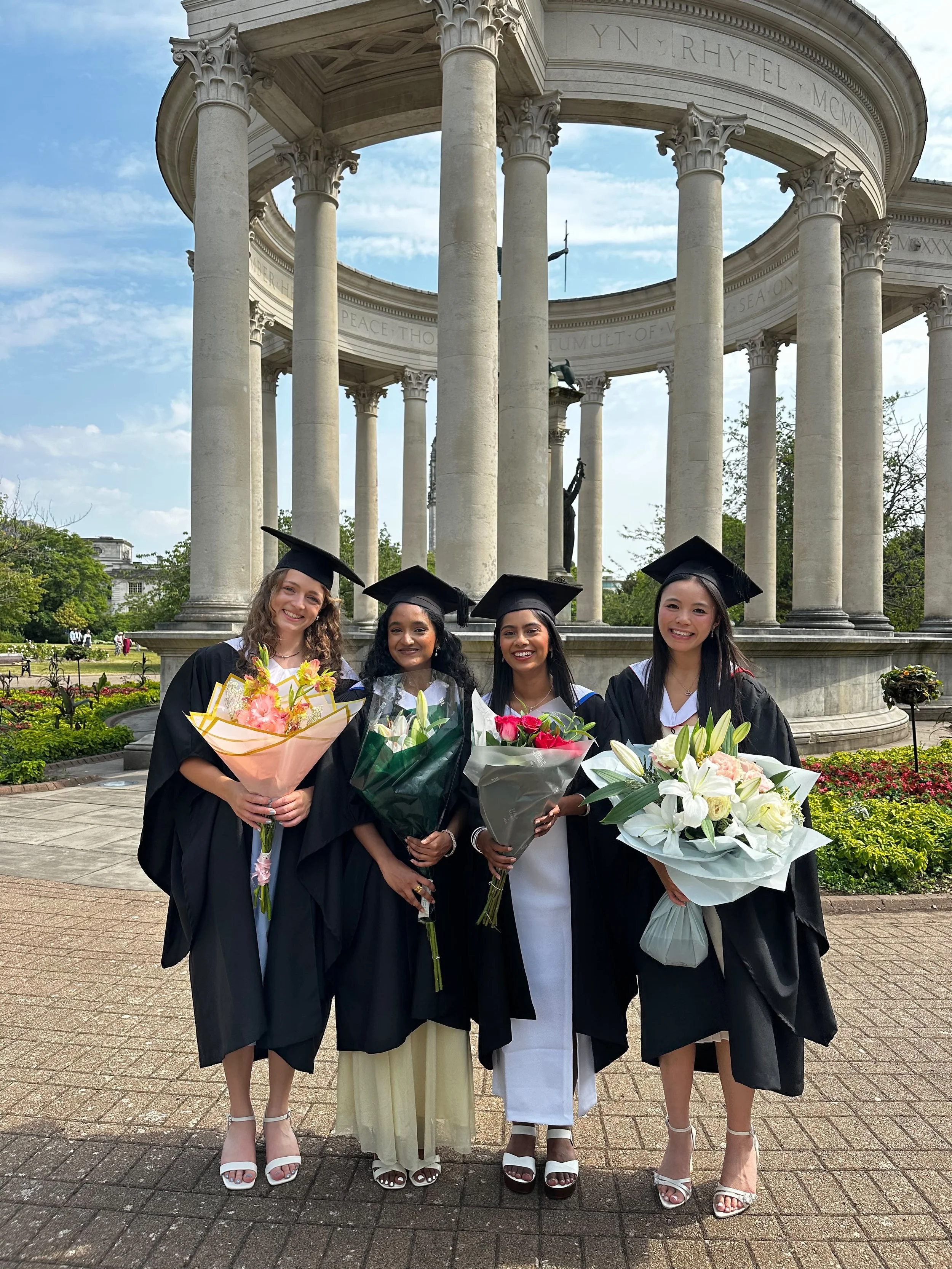 Thalia Lau celebrating graduation with friends from her cohort.