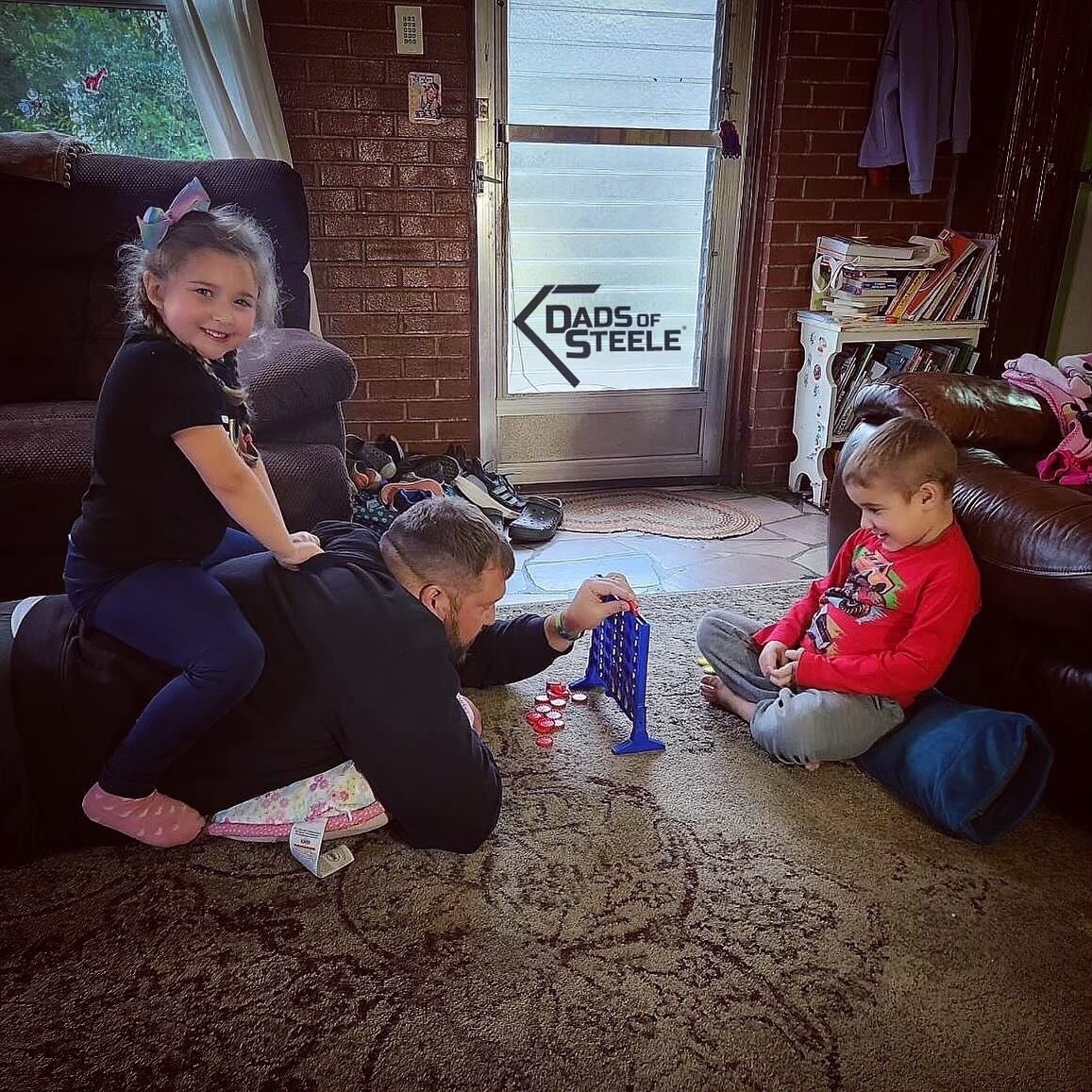 @mccalla65 and his kids playing Connect 4. #dadlife #dads #gamenight #funwithkids#dadsofsteele