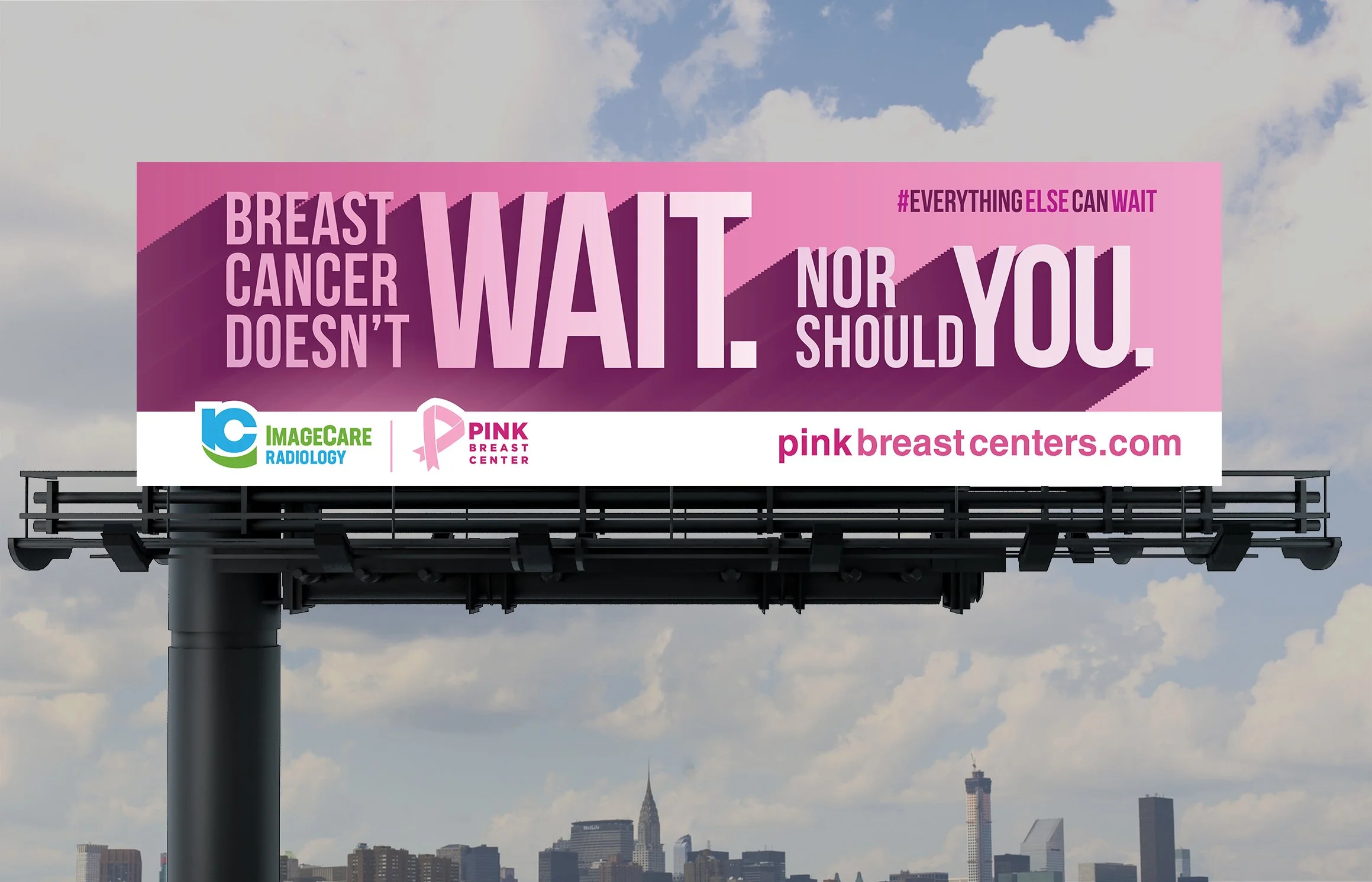 Billboard on a city street promoting breast cancer awareness, with pink background, large text saying 'Breast cancer doesn't wait. Nor should you.' and a website link pinkbreastcenters.com, along with logos for IC ImageCare Radiology and Pink Breast Center.