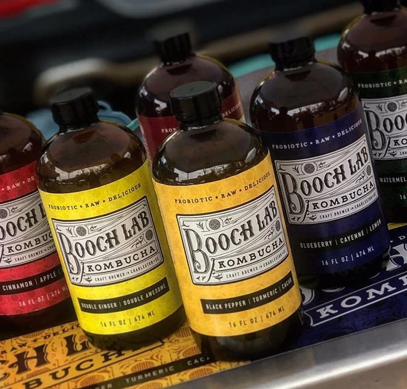 Collection of Booch Lab Kombucha bottles with various flavors.