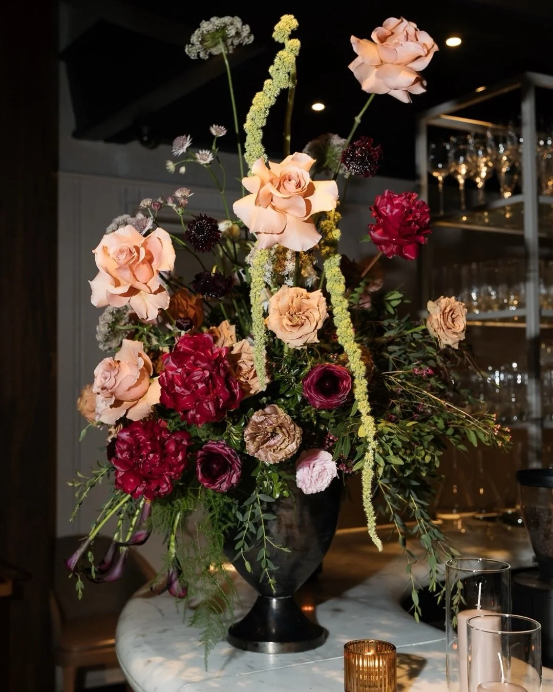 Have you ever wondered what your florist would use for her own (surprise) wedding? 

The look was moody, elegant, timeless, and classic; encompassed by the warmth and glow of candlelight for @whitebrickflorals Fall engagement party turned surprise we