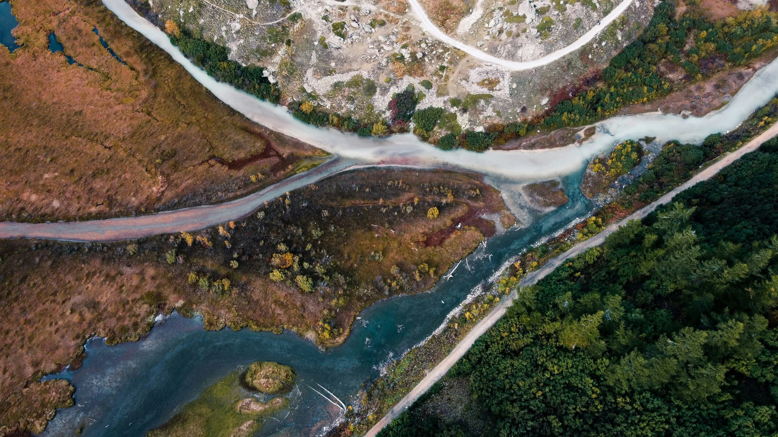 An aerial photograph of rivers converging to illustrate how using IFS and EMDR together create a stronger therapy method.