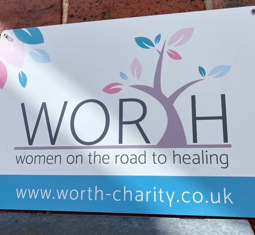 WORTH charity logo — women on the road to healing, supported by Breathe by Jo