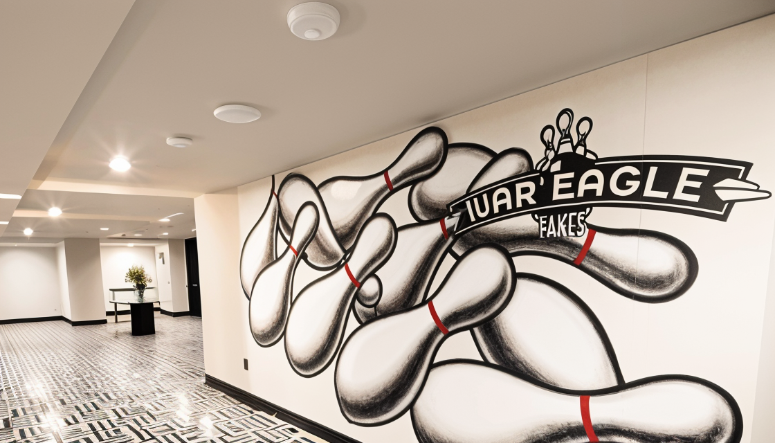 War-Eagle-Lanes_Mural-Corridor_1120x640_UPSCALED.png