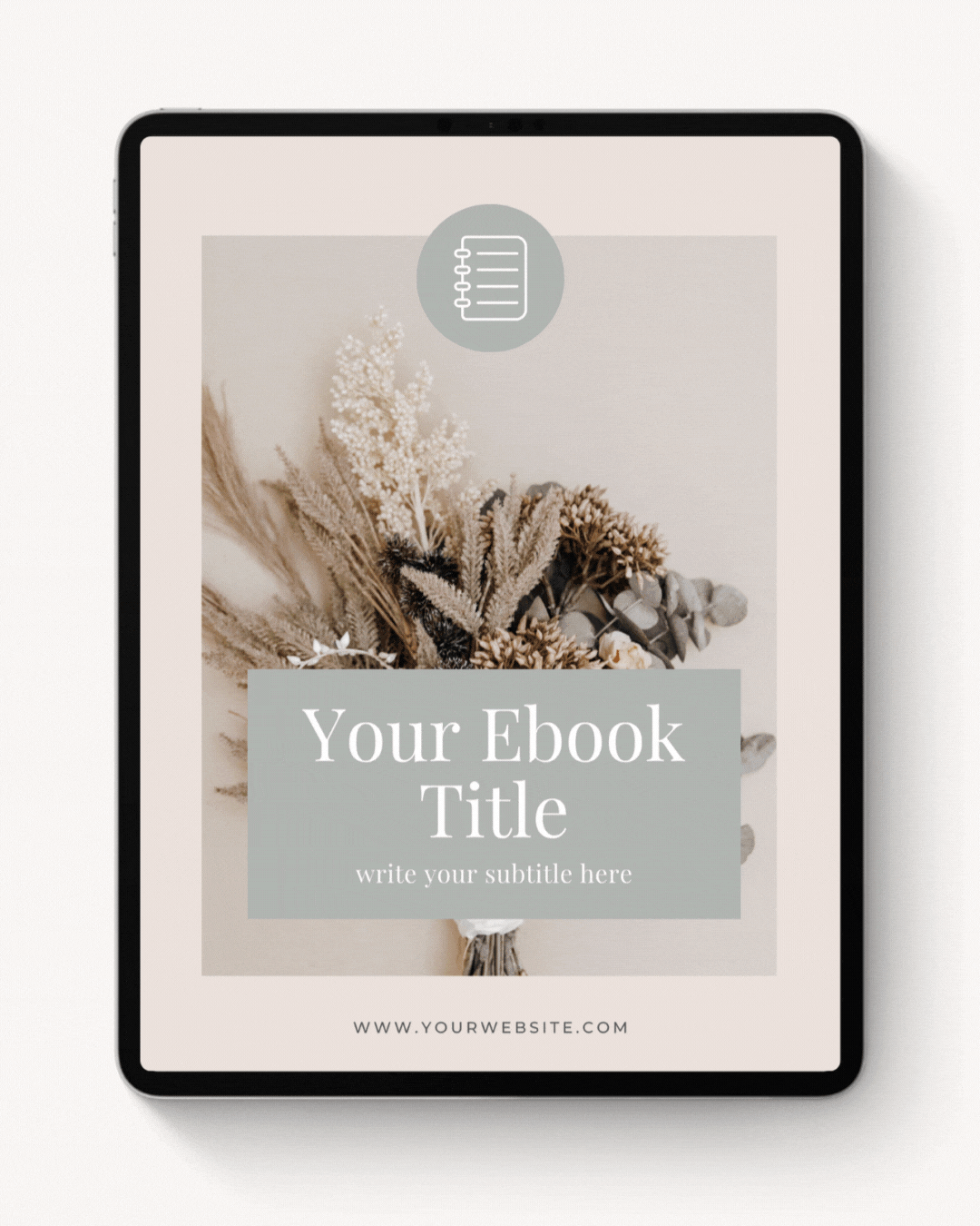 Ebook cover on a tablet featuring dried flowers, with a text area for title and subtitle, and a website URL displayed at the bottom.