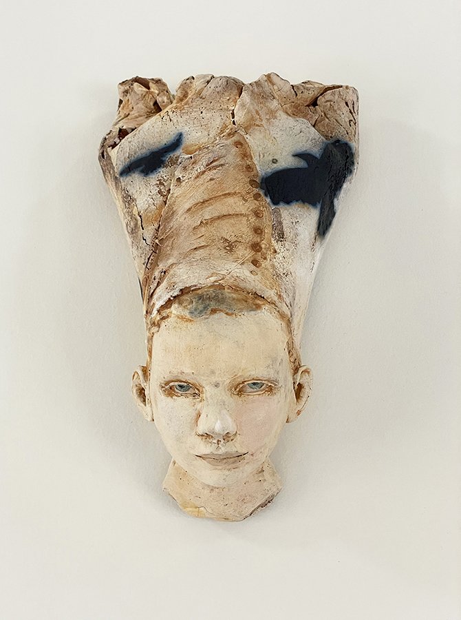 “Thoughts & Memories Head, No 1” ©HG, Mid Fire Sculptural Clay, Engobe, Oxide, and Underglaze, 9” H x 5” W x 3-1/2” D.