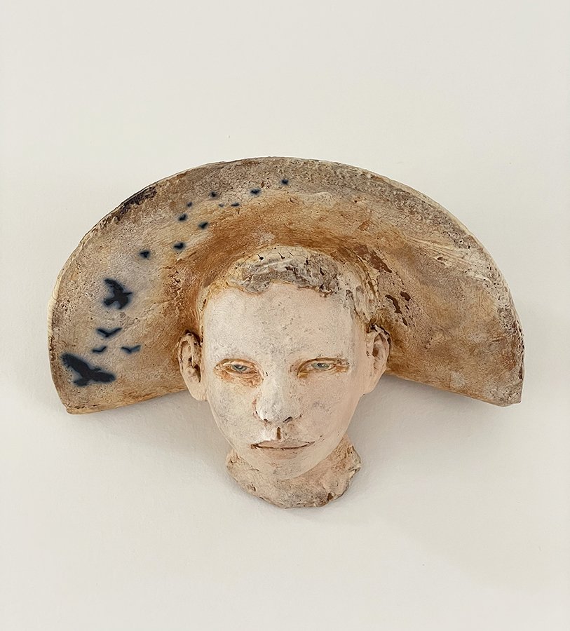 “Thoughts & Memories Head, No 8” ©HG, Mid Fire Sculptural Clay, Engobe, Oxide, and Underglaze, 4-3/4” H x 7-1/2” W x 4-1/2” D.