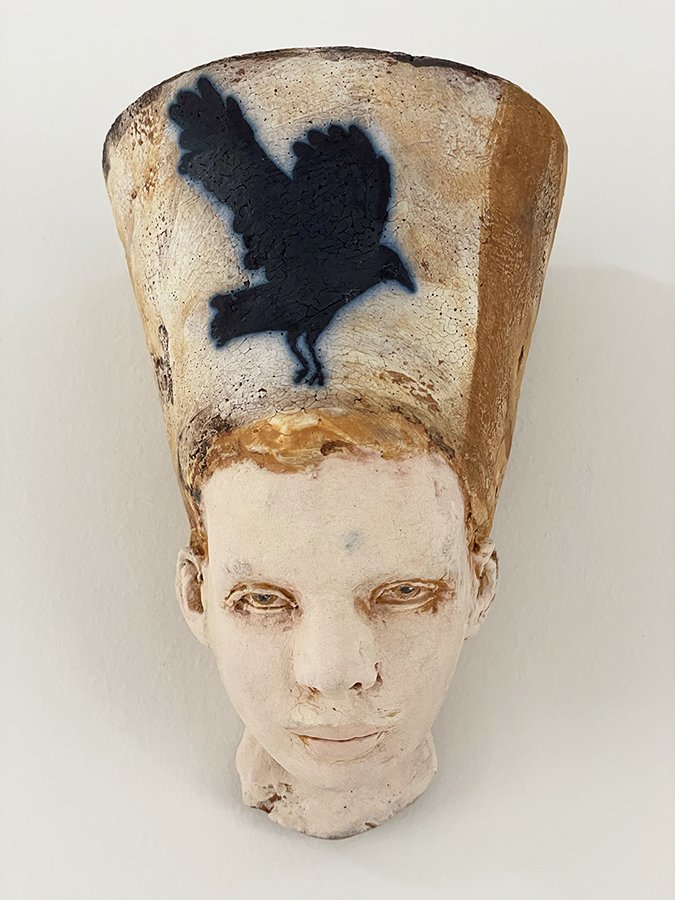 “Thoughts & Memories Head, No 3” ©HG, Mid Fire Sculptural Clay, Engobe, Oxide, and Underglaze, 6-1/2” H x 4-1/2” W x 3-1/2” D.
