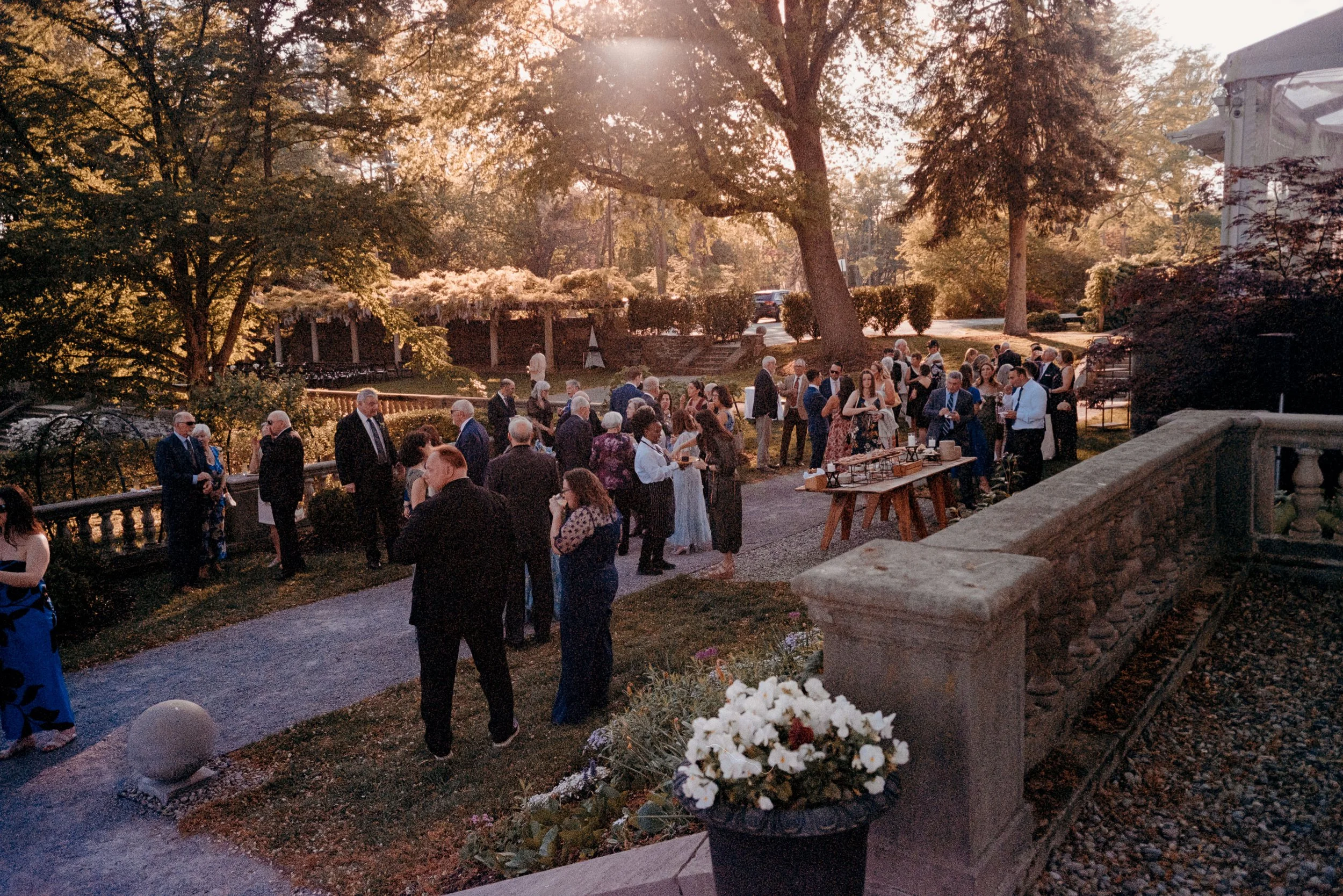 Film wedding photograph of cocktail hour at Curtis Arboretum in Philadelphia