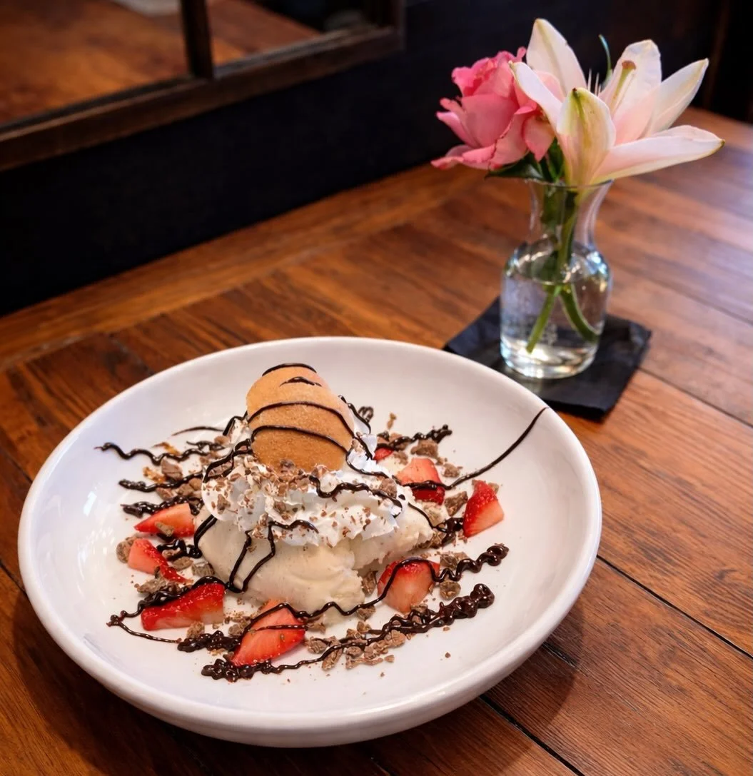Valentines day dessert 🍨 🥂

Vanilla bean Gelato, fresh strawberries, cool whip, hersheys crumbles, vanilla wafers and dark chocolate sauce. . . $14