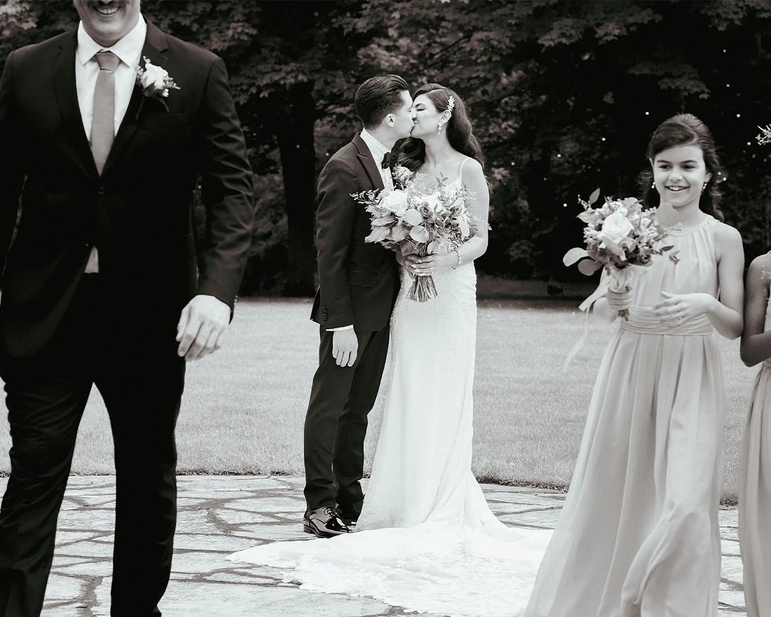 There&rsquo;s a certain kind of beauty that lives in the in-between.

The stillness before a ceremony begins. The way hands find each other without being asked. The quiet hum of anticipation that fills the air before vows are spoken.

These are the m