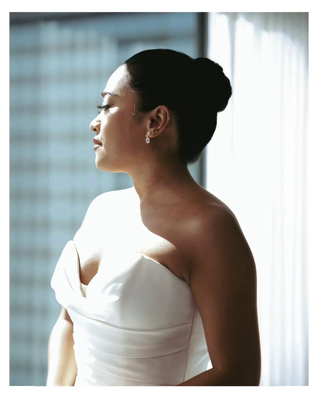 There is something quietly powerful about the in-between moments on a wedding day. The pause before stepping into the dress. The stillness of slipping into shoes chosen with care. The light falling across the room as anticipation builds.

These frame