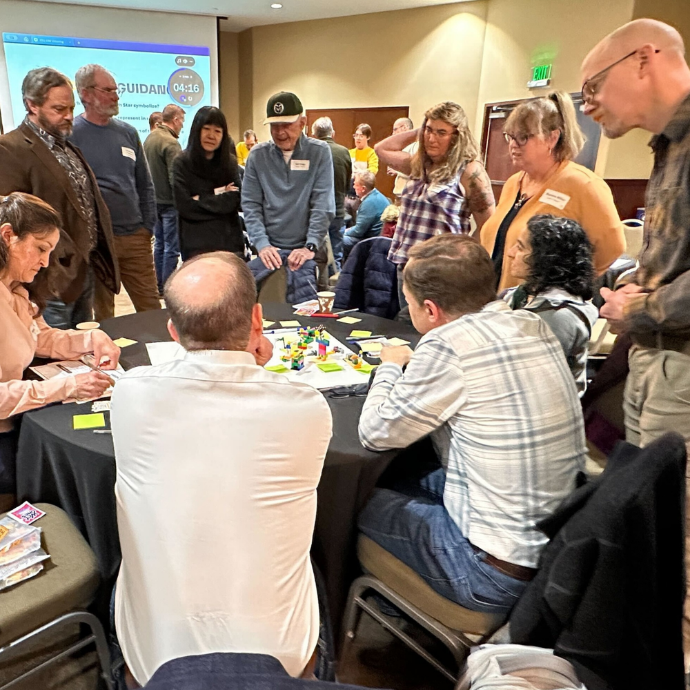 Participants working through a human-centered design exercise