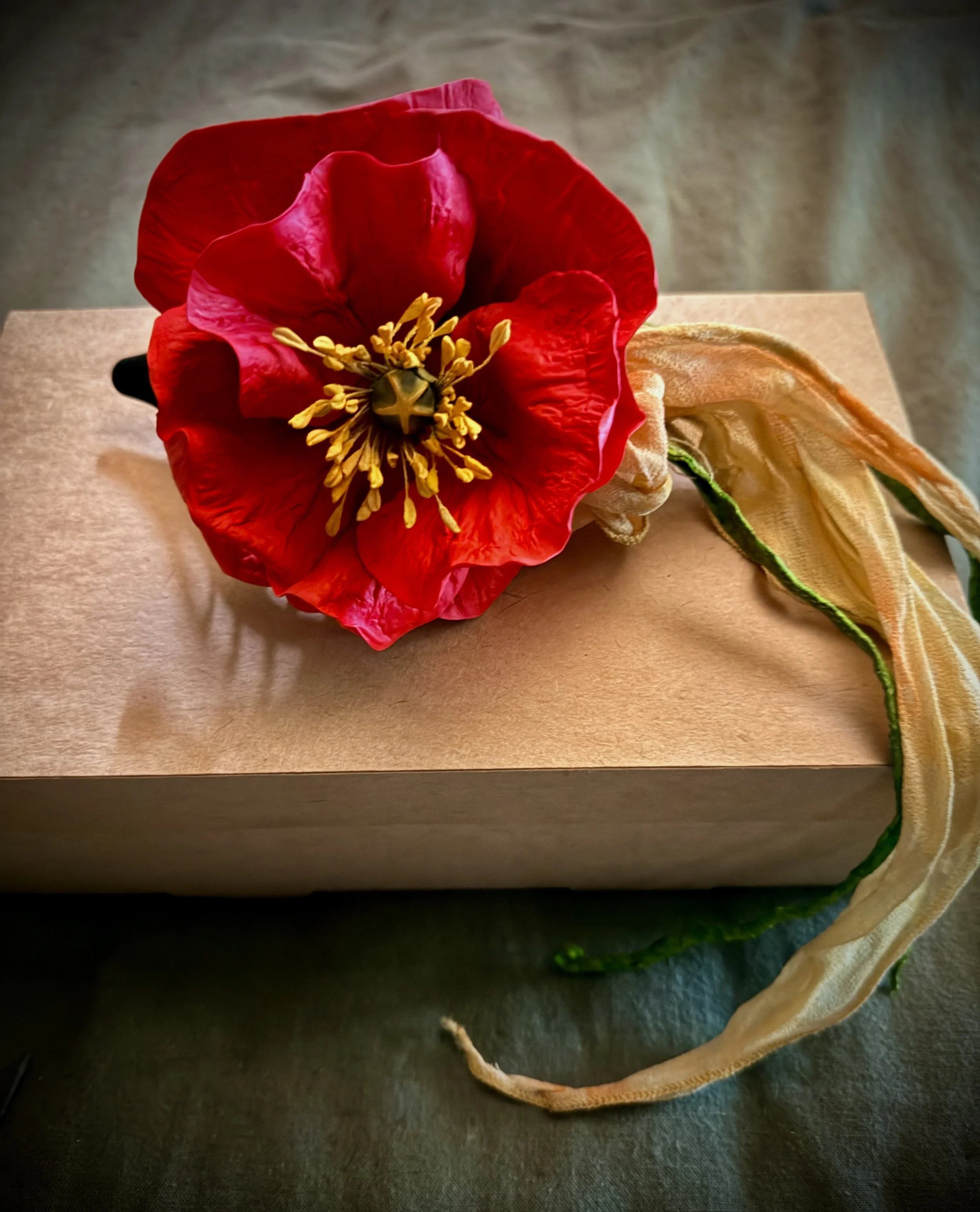 ruby red  Poppy fascinator